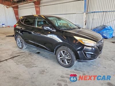 Czwarte zdjęcie samochodu z boku: 2015 HYUNDAI TUCSON GLS VIN:KM8JT3AF8FU103504 - miniatura