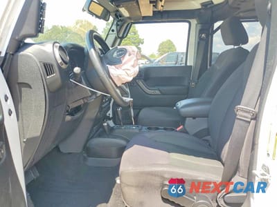Zdjęcie 7 z 12 samochodu: 2013 JEEP WRANGLER UNLIMITED SPORT VIN:1C4BJWDG5DL502121 - miniatura