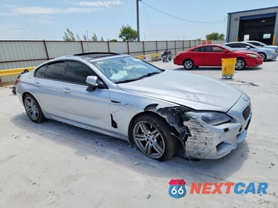 Czwarte zdjęcie samochodu z boku: 2014 BMW 640 XI GRAN COUPE VIN:WBA6B8C54EDZ72322 - miniatura