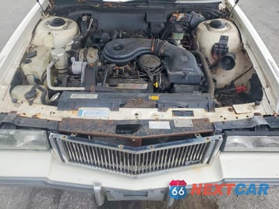 Zdjęcie 11 z 12 samochodu: 1988 CADILLAC DEVILLE VIN:1G6CD1150J4301933 - miniatura