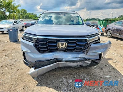 Piąte zdjęcie samochodu w środku: 2025 HONDA PILOT TOURING VIN:5FNYG1H71SB149740 - miniatura