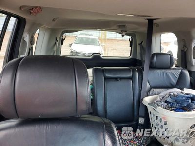 Zdjęcie 10 z 13 samochodu: 2011 HONDA PILOT EXL VIN:5FNYF4H55BB050230 - miniatura