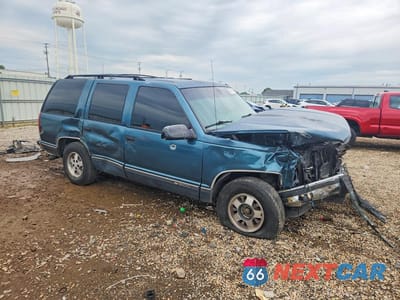 Czwarte zdjęcie samochodu z boku: 1995 CHEVROLET TAHOE C1500 VIN:1GNEC13K6SJ376450 - miniatura