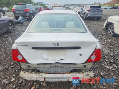 Zdjęcie 6 z 13 samochodu: 2004 HONDA CIVIC DX VP VIN:1HGEM22134L079021 - miniatura