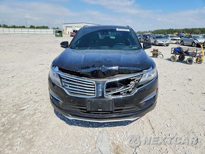 Piąte zdjęcie samochodu w środku: 2017 LINCOLN MKC SELECT VIN:5LMCJ2D95HUL35489 - miniatura
