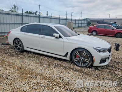 Czwarte zdjęcie samochodu z boku: 2018 BMW 750 XI VIN:WBA7F2C59JB238416 - miniatura