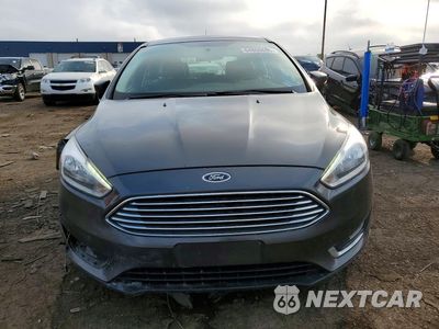 Piąte zdjęcie samochodu w środku: 2017 FORD FOCUS TITANIUM VIN:1FADP3N24HL220170 - miniatura