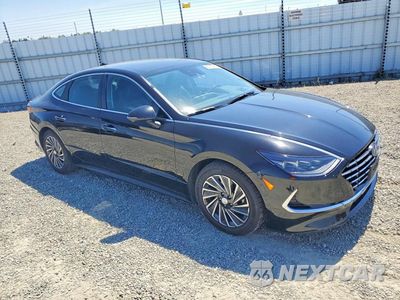 Czwarte zdjęcie samochodu z boku: 2022 HYUNDAI SONATA HYBRID LIMITED VIN:KMHL54JJ1NA050187 - miniatura