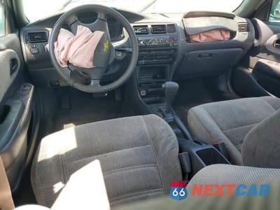 Zdjęcie 8 z 12 samochodu: 1997 TOYOTA COROLLA DX VIN:1NXBB02E8VZ539019 - miniatura