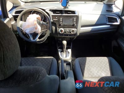 Zdjęcie 8 z 12 samochodu: 2016 HONDA FIT LX VIN:JHMGK5H51GX014043 - miniatura