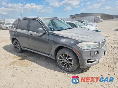Czwarte zdjęcie samochodu z boku: 2014 BMW X5 XDRIVE50I VIN:5UXKR6C5XE0C02264 - miniatura