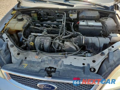Zdjęcie 11 z 12 samochodu: 2005 FORD FOCUS ZX4 VIN:1FAFP34N35W304415 - miniatura