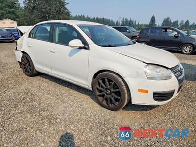 Czwarte zdjęcie samochodu z boku: 2009 VOLKSWAGEN JETTA S VIN:3VWJZ71K99M081977 - miniatura