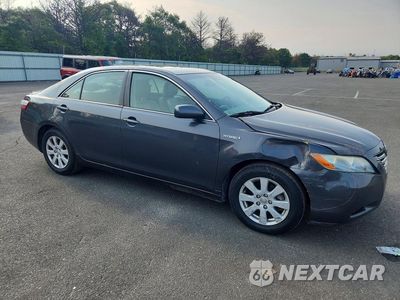 Czwarte zdjęcie samochodu z boku: 2007 TOYOTA CAMRY HYBRID VIN:JTNBB46K573041182 - miniatura