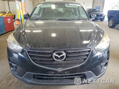 Piąte zdjęcie samochodu w środku: 2016 MAZDA CX-5 TOURING VIN:JM3KE4CY9G0617529 - miniatura