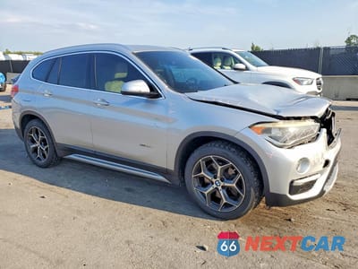 Czwarte zdjęcie samochodu z boku: 2017 BMW X1 XDRIVE28I VIN:WBXHT3Z39H4A54450 - miniatura