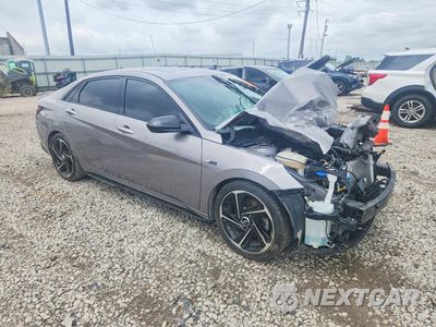 Czwarte zdjęcie samochodu z boku: 2022 HYUNDAI ELANTRA N LINE VIN:KMHLR4AF5NU225152 - miniatura