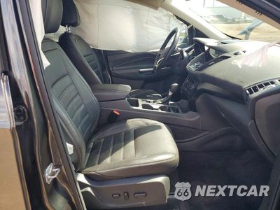 Zdjęcie 7 z 13 samochodu: 2017 FORD ESCAPE TITANIUM VIN:1FMCU9J98HUB78502 - miniatura
