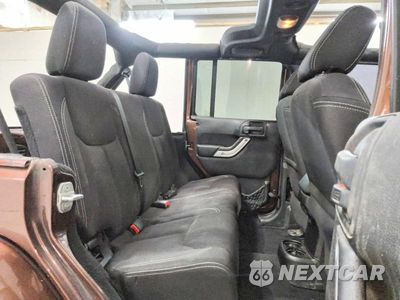 Zdjęcie 11 z 13 samochodu: 2013 JEEP WRANGLER UNLIMITED SAHARA VIN:1C4BJWEG0DL698502 - miniatura