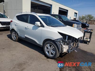 Czwarte zdjęcie samochodu z boku: 2010 HYUNDAI TUCSON GLS VIN:KM8JU3AC9AU096395 - miniatura