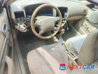 Zdjęcie 8 z 13 samochodu: 1999 TOYOTA COROLLA VE VIN:1NXBR12E2XZ287868 - miniatura