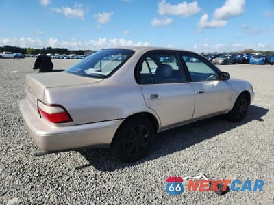 Trzecie zdjęcie samochodu z tyłu: 1994 TOYOTA COROLLA DX VIN:1NXAE09B2RZ193165 - miniatura