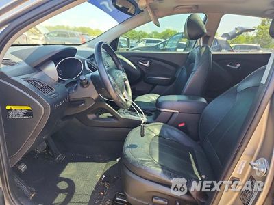 Zdjęcie 7 z 13 samochodu: 2013 HYUNDAI TUCSON LIMITED VIN:KM8JUCAC0DU557620 - miniatura