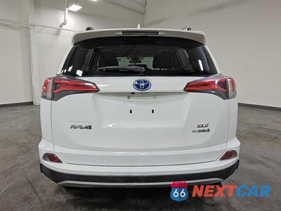 Zdjęcie 6 z 13 samochodu: 2018 TOYOTA RAV4 HYBRID XLE VIN:JTMRJREV6JD192614 - miniatura