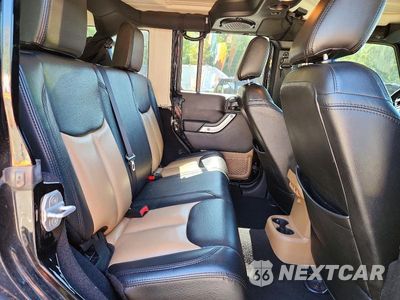 Zdjęcie 10 z 12 samochodu: 2013 JEEP WRANGLER UNLIMITED SAHARA VIN:1C4BJWEG2DL508778 - miniatura