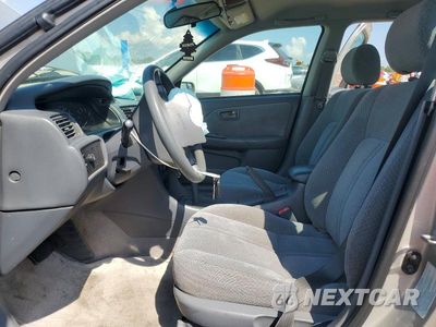 Zdjęcie 7 z 12 samochodu: 2001 TOYOTA CAMRY LE VIN:4T1BG22K41U048122 - miniatura