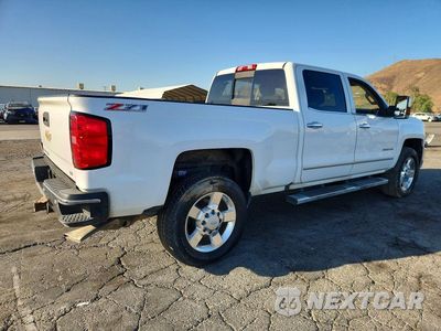 Trzecie zdjęcie samochodu z tyłu: 2016 CHEVROLET SILVERADO K2500 HEAVY DUTY LTZ VIN:1GC1KWE85GF102837 - miniatura