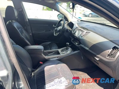 Piąte zdjęcie samochodu w środku: 2015 KIA SPORTAGE EX VIN:KNDPCCAC6F7718670 - miniatura