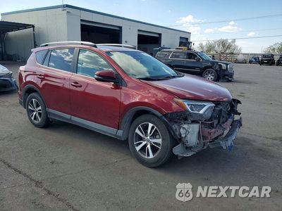 Czwarte zdjęcie samochodu z boku: 2018 TOYOTA RAV4 XLE VIN:2T3WFREV2JW508906 - miniatura