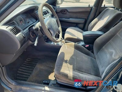 Zdjęcie 7 z 12 samochodu: 1994 TOYOTA COROLLA DX VIN:1NXAE09B9RZ135070 - miniatura