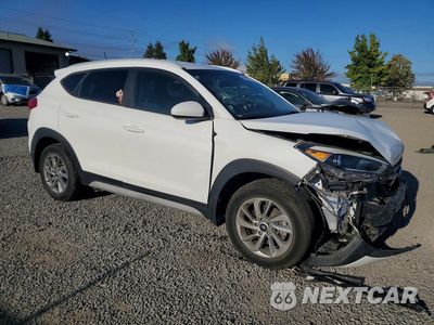 Czwarte zdjęcie samochodu z boku: 2017 HYUNDAI TUCSON SE VIN:KM8J3CA44HU515713 - miniatura