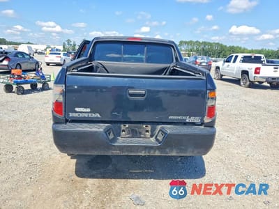 Zdjęcie 6 z 12 samochodu: 2006 HONDA RIDGELINE RT VIN:2HJYK16296H562202 - miniatura