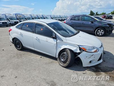 Czwarte zdjęcie samochodu z boku: 2012 FORD FOCUS SE VIN:1FAHP3F28CL201694 - miniatura
