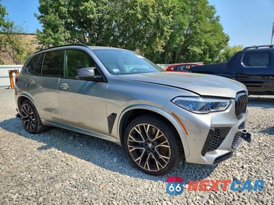 Czwarte zdjęcie samochodu z boku: 2021 BMW X5 M VIN:5YMJU0C08M9G38996 - miniatura
