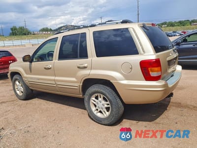 Drugie zdjęcie samochodu z przodu: 1999 JEEP GRAND CHEROKEE LIMITED VIN:1J4GW68NXXC696921 - miniatura