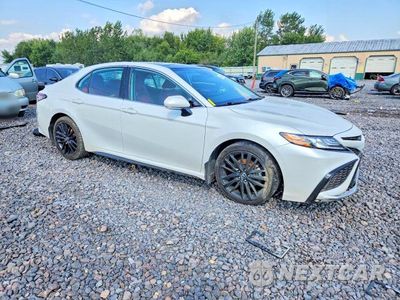 Czwarte zdjęcie samochodu z boku: 2023 TOYOTA CAMRY VIN:4T1K61AK8PU731058 - miniatura