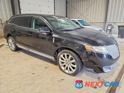 Czwarte zdjęcie samochodu z boku: 2010 LINCOLN MKT VIN:2LMHJ5FR3ABJ03402 - miniatura