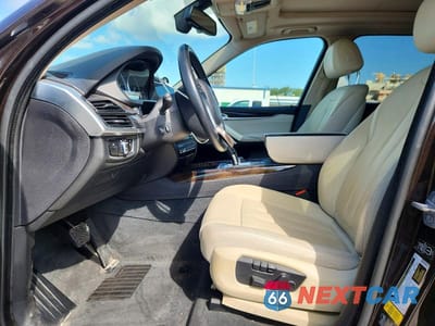 Zdjęcie 7 z 13 samochodu: 2014 BMW X5 XDRIVE35I VIN:5UXKR0C58E0H16949 - miniatura