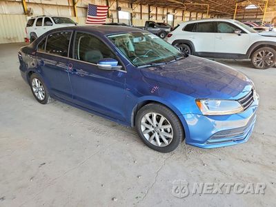 Czwarte zdjęcie samochodu z boku: 2017 VOLKSWAGEN JETTA SE VIN:3VWDB7AJ4HM309987 - miniatura