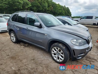 Czwarte zdjęcie samochodu z boku: 2013 BMW X5 XDRIVE35I VIN:5UXZV4C59D0B09765 - miniatura