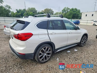 Trzecie zdjęcie samochodu z tyłu: 2016 BMW X1 XDRIVE28I VIN:WBXHT3C36GP881907 - miniatura