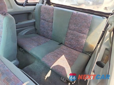 Zdjęcie 10 z 12 samochodu: 2001 CHEVROLET TRACKER VIN:2CNBE18C716906066 - miniatura