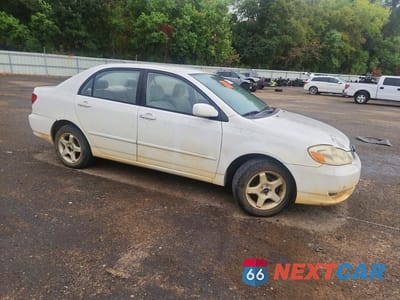 Czwarte zdjęcie samochodu z boku: 2003 TOYOTA COROLLA LE VIN:JTDBR32E230028458 - miniatura