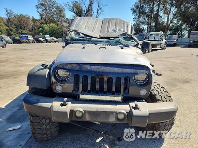 Piąte zdjęcie samochodu w środku: 2013 JEEP WRANGLER UNLIMITED SPORT VIN:1C4BJWDG8DL666852 - miniatura
