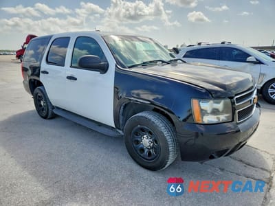 Czwarte zdjęcie samochodu z boku: 2014 CHEVROLET TAHOE POLICE VIN:1GNLC2E0XER150782 - miniatura