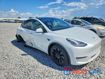 Czwarte zdjęcie samochodu z boku: 2023 TESLA MODEL Y VIN:7SAYGDEE2PA081024 - miniatura
